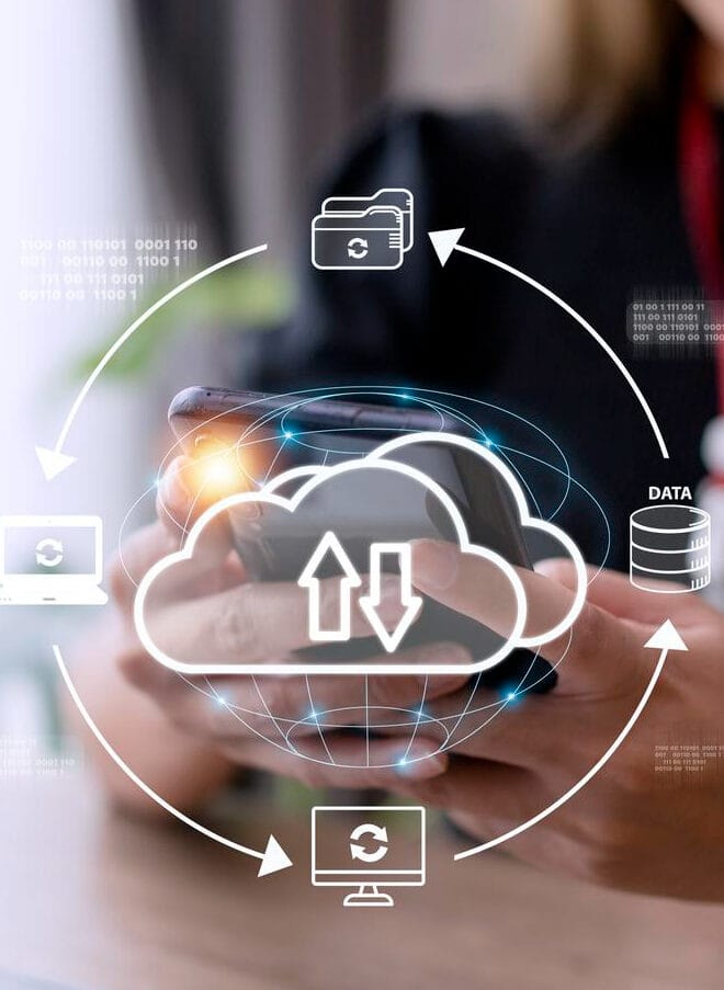 Person holding a smartphone with cloud data transfer icons and graphics displayed on the screen.